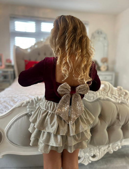 Burgundy bow back bodysuit and Matt gold interchangeable bow