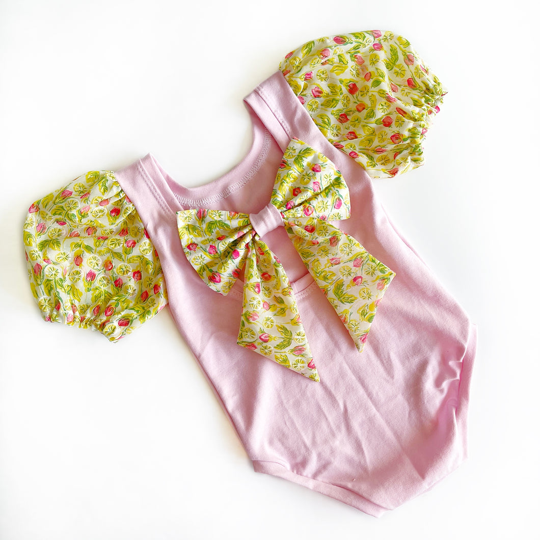 Vintage pink lemonade bow back bodysuit