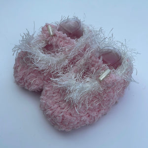 Hand knitted pink fluffy dolly shoes
