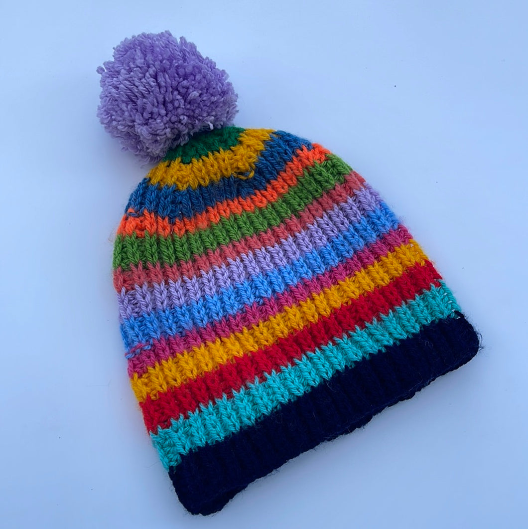 Hand knitted rainbow hat 7-11 yrs