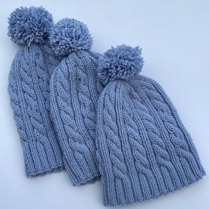 Hand knitted Aran hats in blue grey